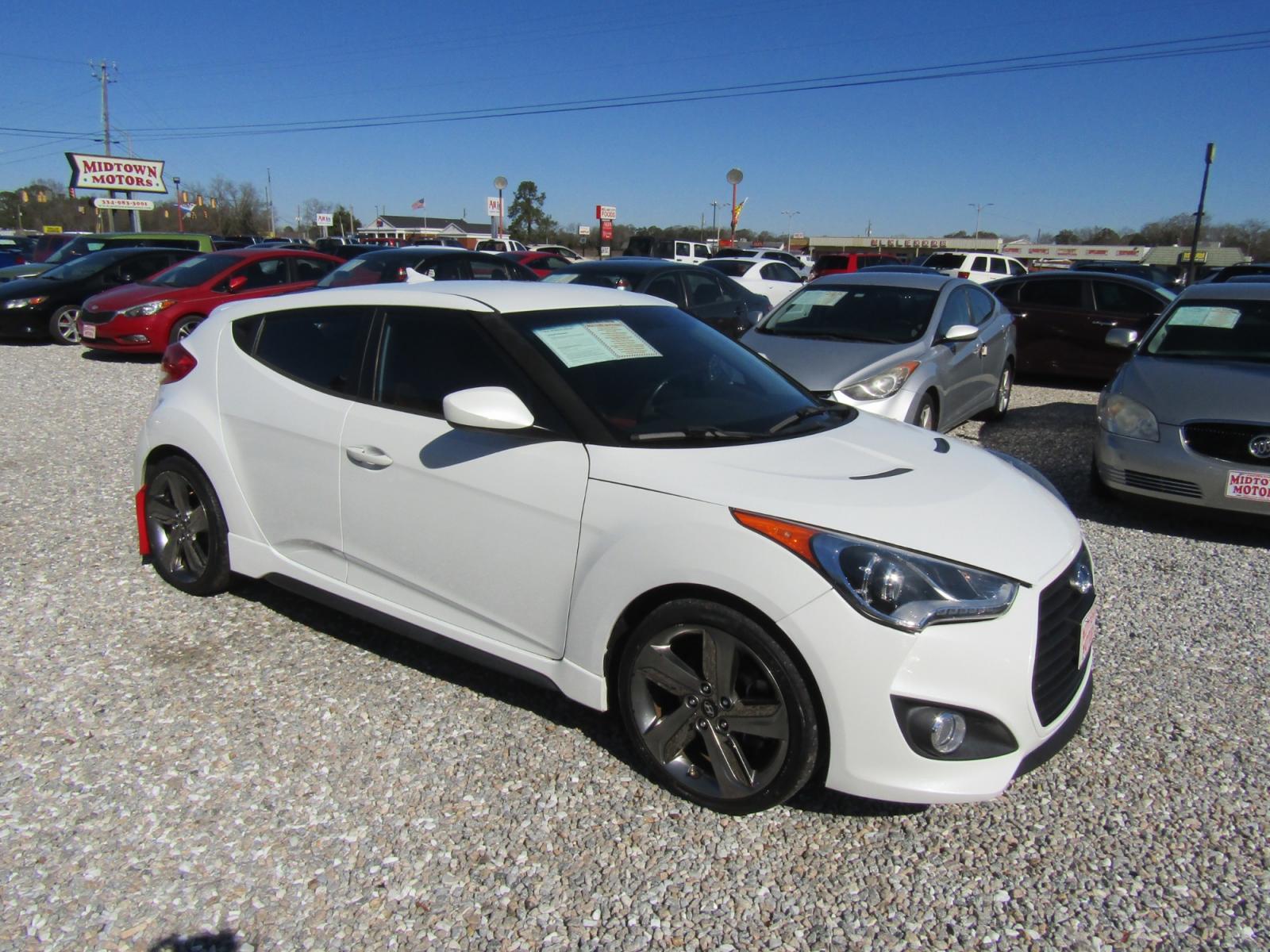 2014 White /Red Hyundai Veloster (KMHTC6AE3EU) with an 4 CYL engine, 6-Speed Manual transmission, located at 15016 S Hwy 231, Midland City, AL, 36350, (334) 983-3001, 31.306210, -85.495277 - Photo #0